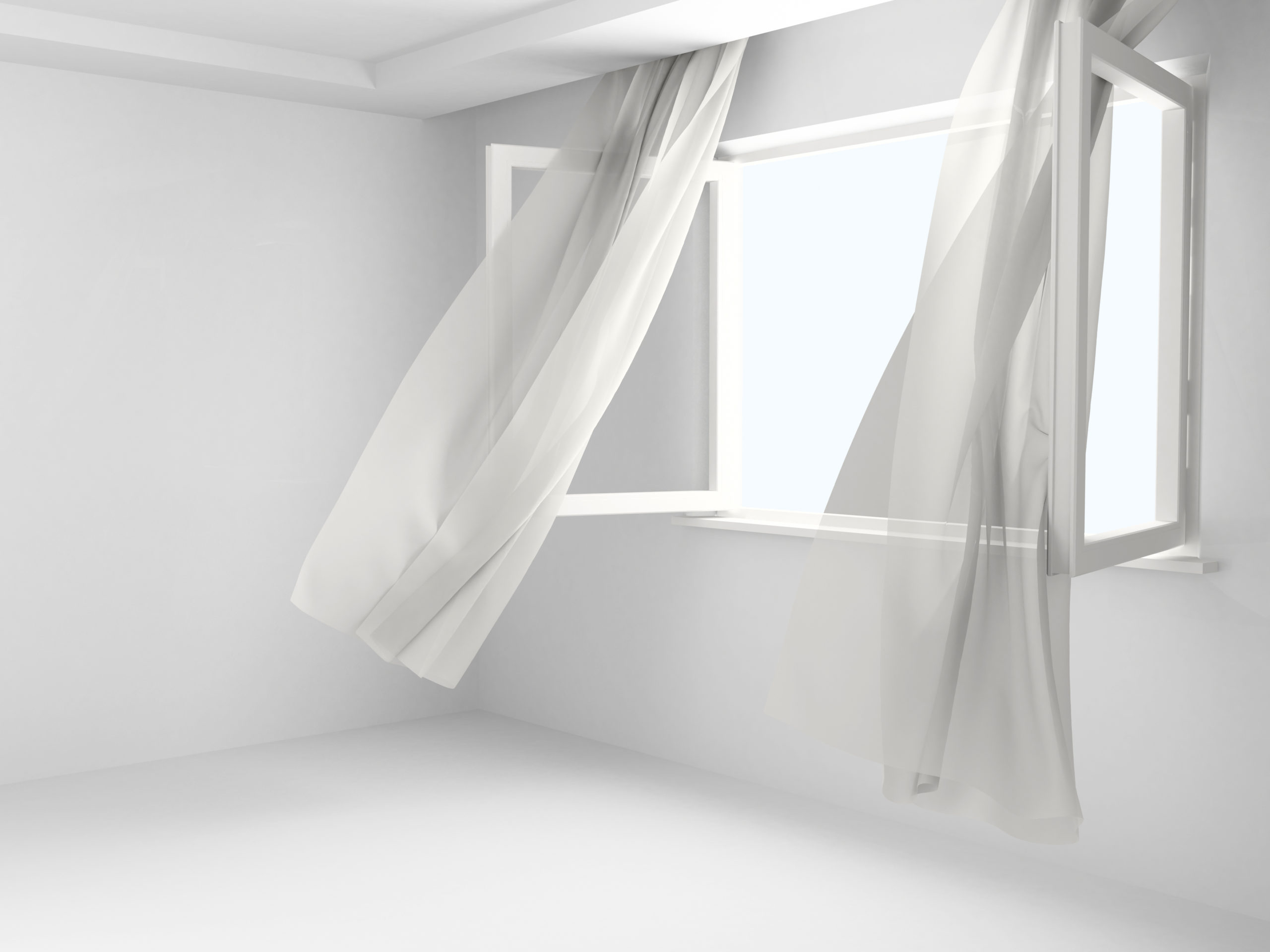 White room with an open window and curtains blowing